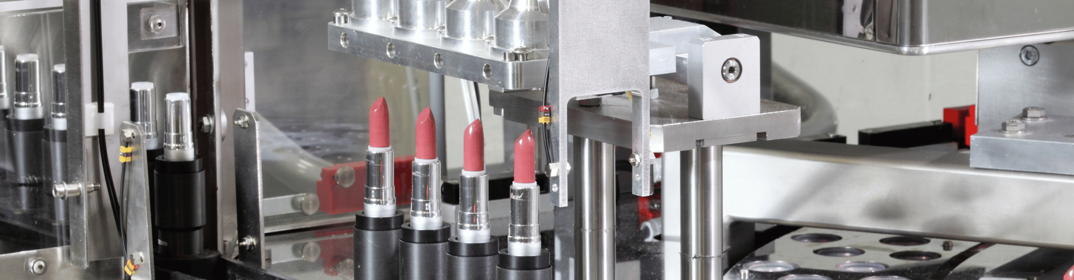 Pink lipstick in lab produced to cosmetics good manufacturing practices (cGMPs).