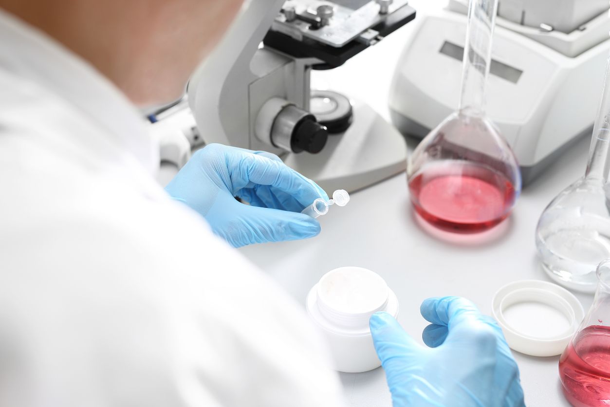 A lab technician checks a cosmetic as part of MoCRA's safety substantiation.
