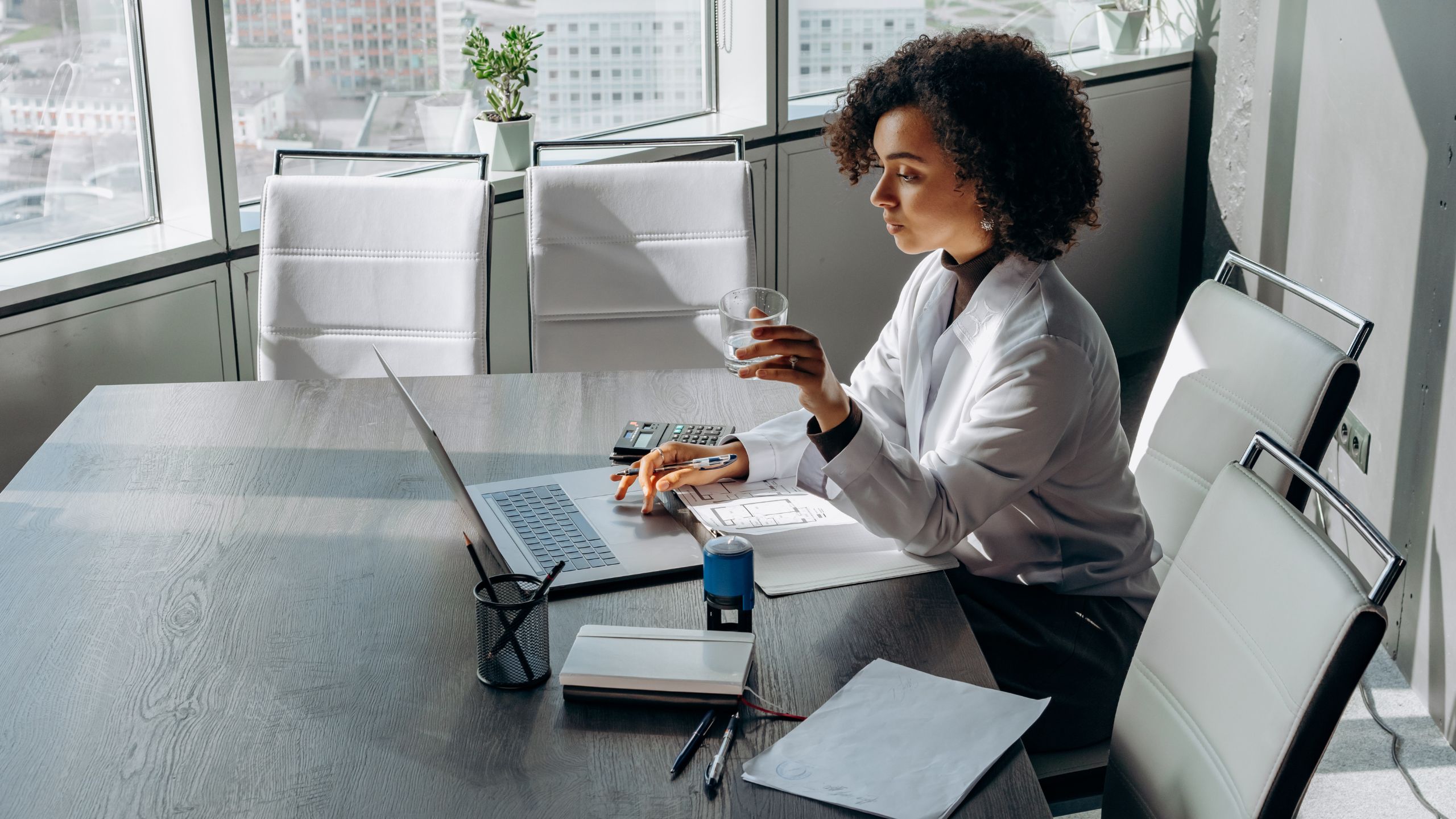 A PCQI sits in her office as she documents compliance.