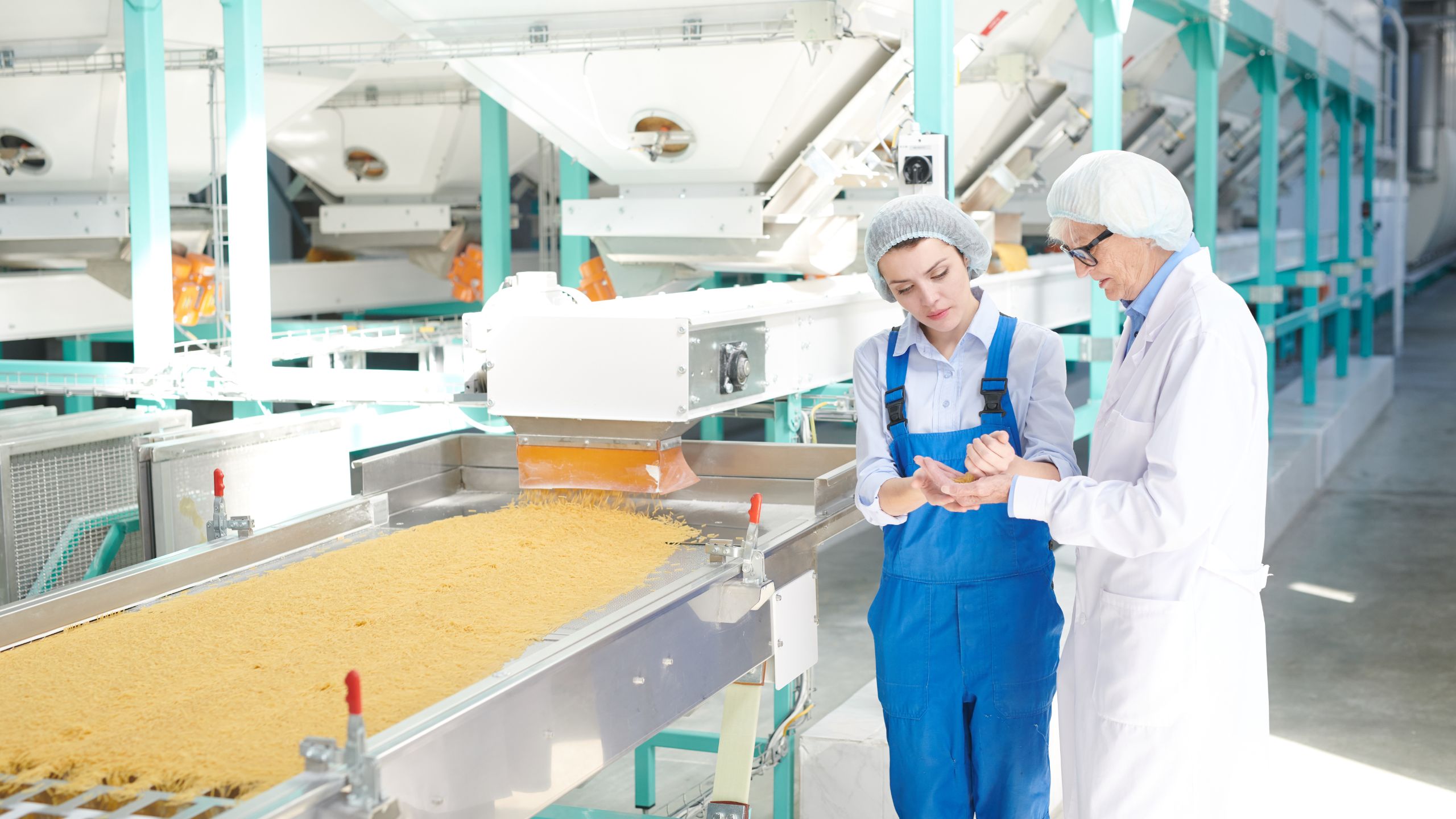 An SQF Practitioner examines product to ensure it is in line with their food defense program.