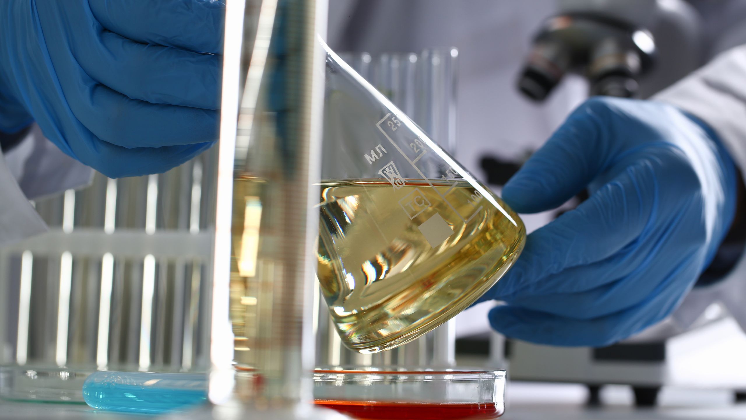 A drug technician evaluates the ingredient and formulation of their latest product.