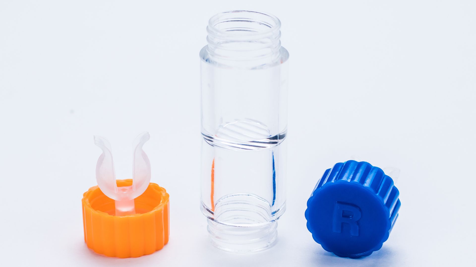 A container of Ortho-K Lenses is on display.